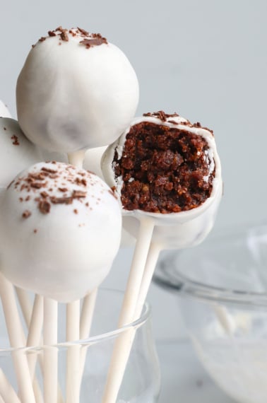 cake pops with bite removed to show texture.