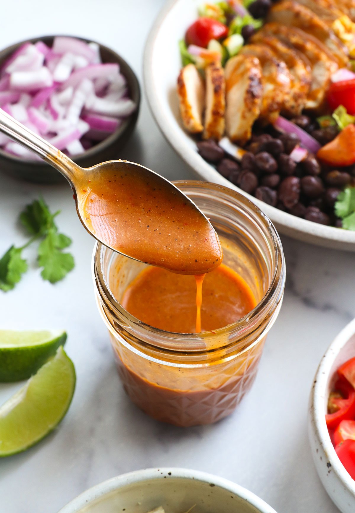 Honey chipotle vinegar drip the spoon from the jar into the jar.