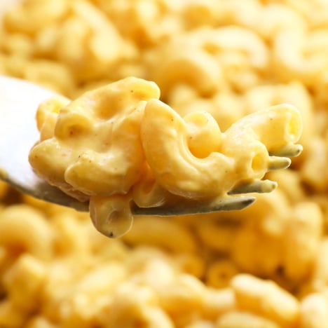 vegan mac and cheese lifted on fork.