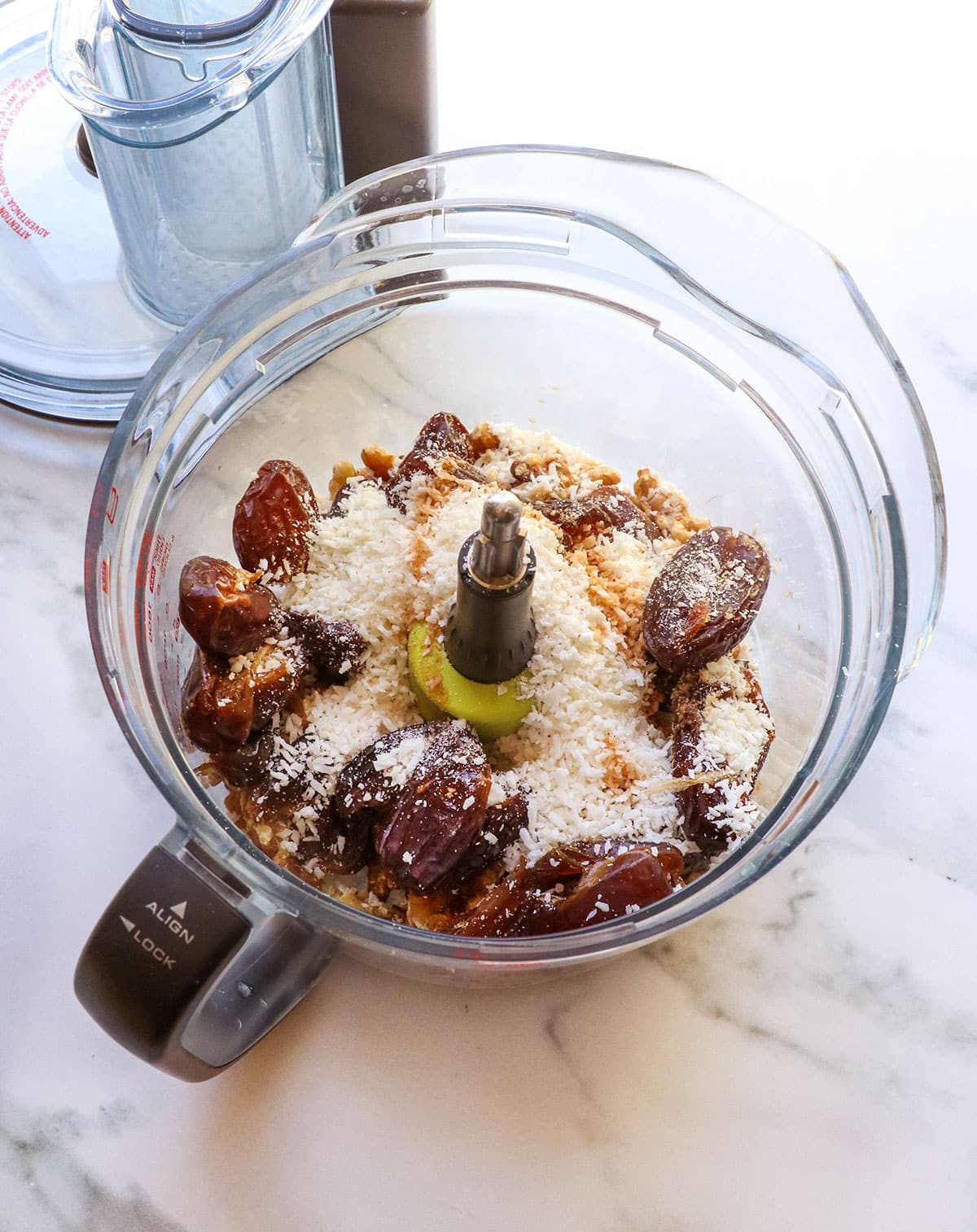 dates, coconut, walnuts, and salt in a food processor with an S-blade.