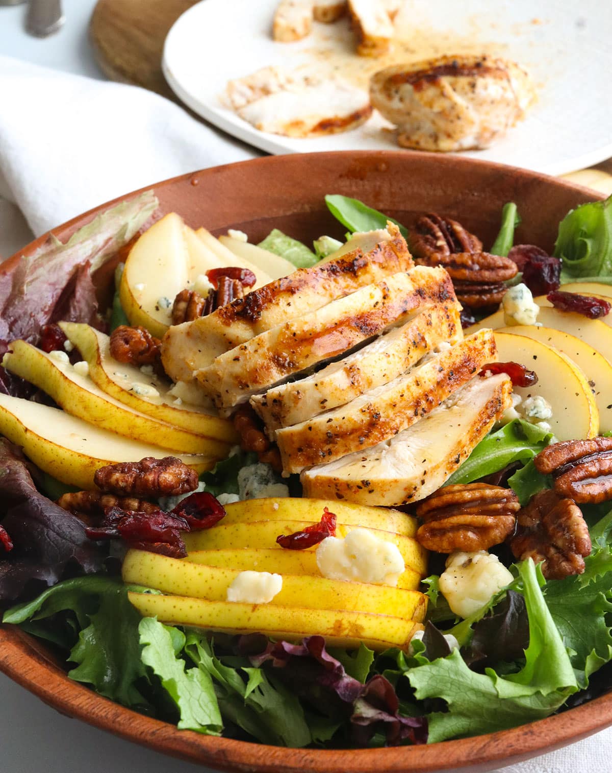 baked chicken breast added to the pear and gorgonzola salad.
