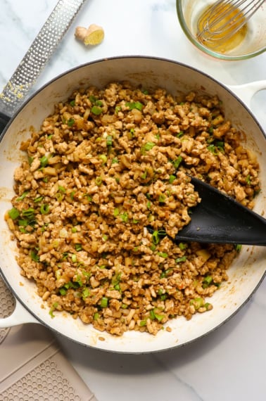 turkey lettuce wrap filling ready to serve in a white pan.
