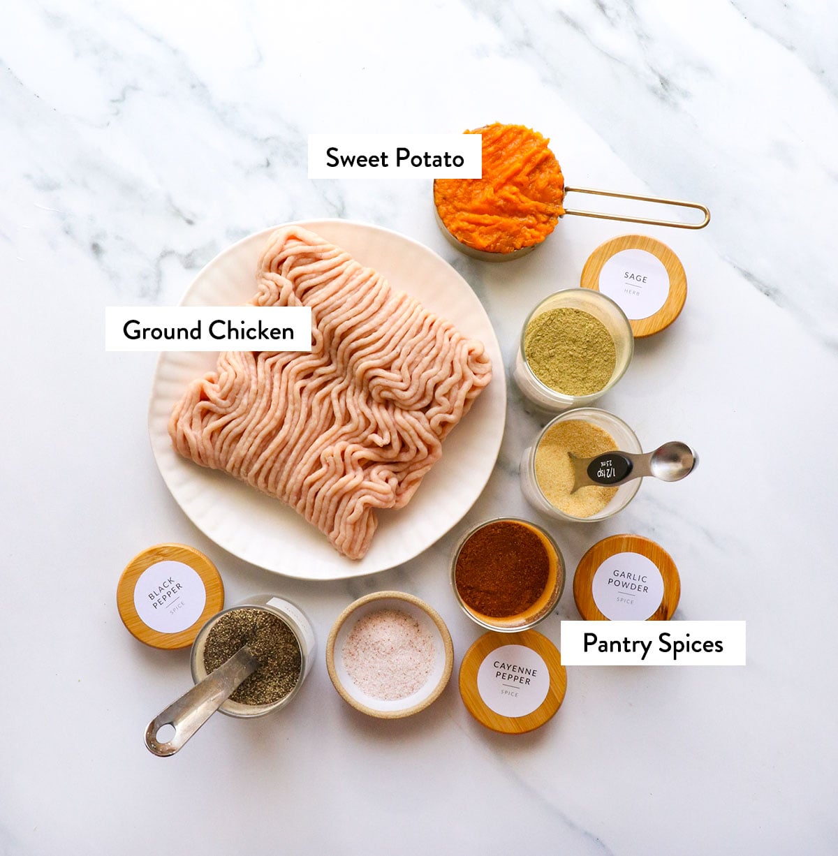 ground chicken, sweet potato, and pantry spices labeled in jars.