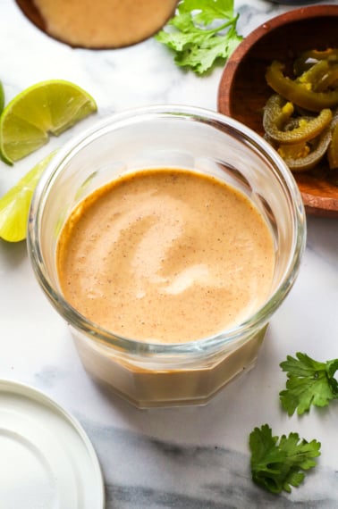 creamy jalapeno sauce in a glass jar.