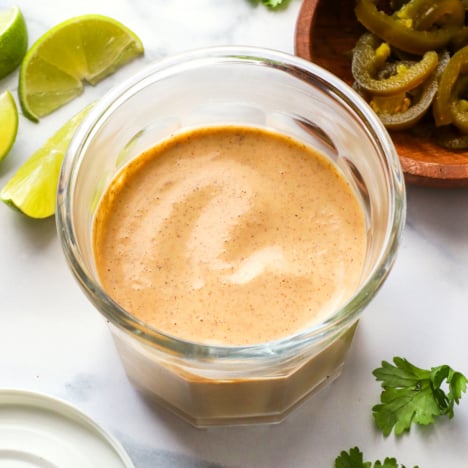 creamy jalapeno sauce in a glass jar.