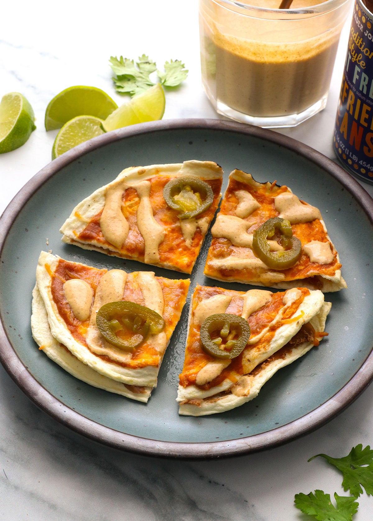 creamy jalapeno sauce served on a mexican pizza.