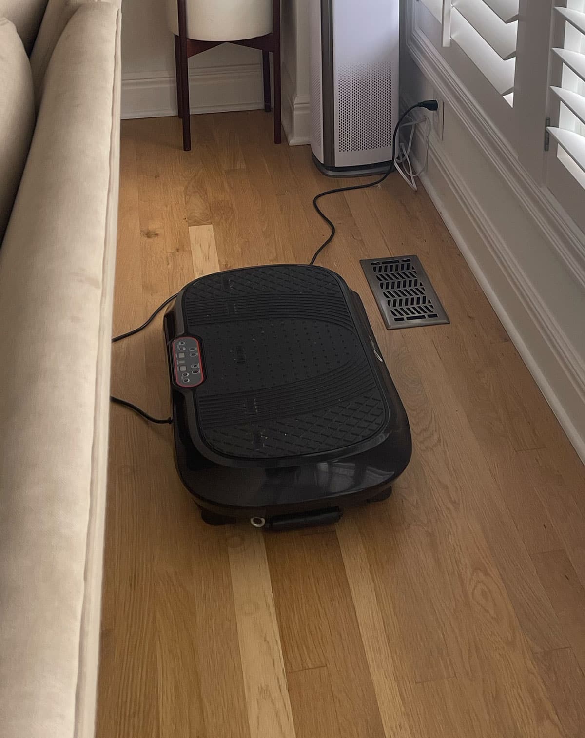 vibration plate plugged in behind my couch.